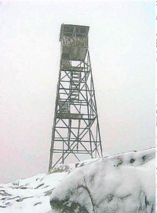 The Hurricane Mountain fire tower weathering the winter winds and snow during December 2004. Courtesy Warren Johnsen